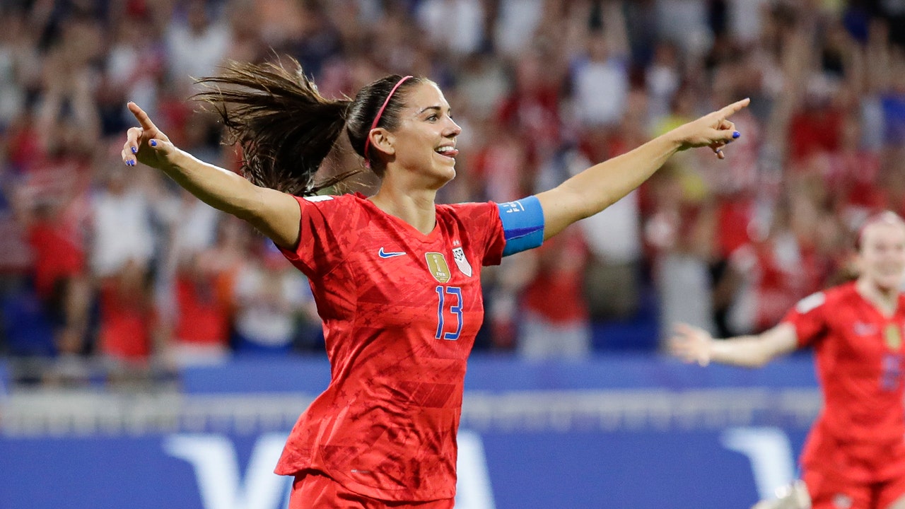 Morgan scores and Naeher saves in 2-1 victory over England.